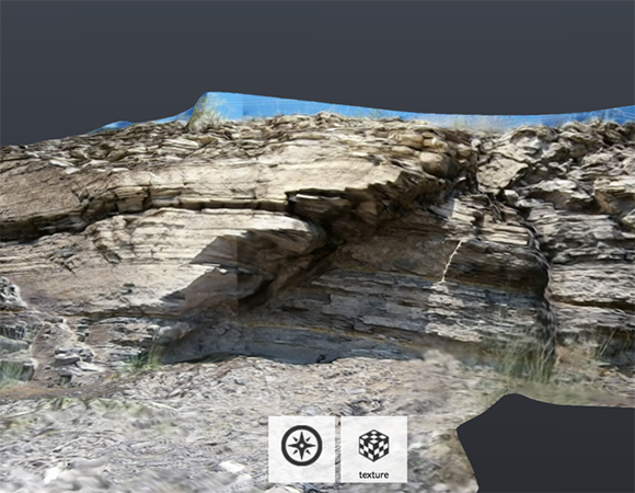 Photo of an outcrop overlaying a point cloud of data. A point cloud is a series of data points that have been plotted in a 3-dimensional coordinate system. 