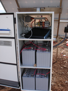 HUGHES modem and batteries in enclosure