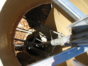 looking down one of holes, jig seen on top