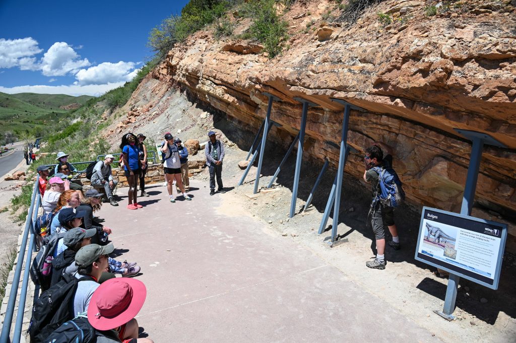 group in front of outcrop