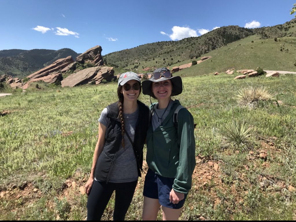 Geo-Launchpad interns Allison Sowers and Madalyn Massey smiling on the "Walk Through Time" field trip in Morrison, CO.