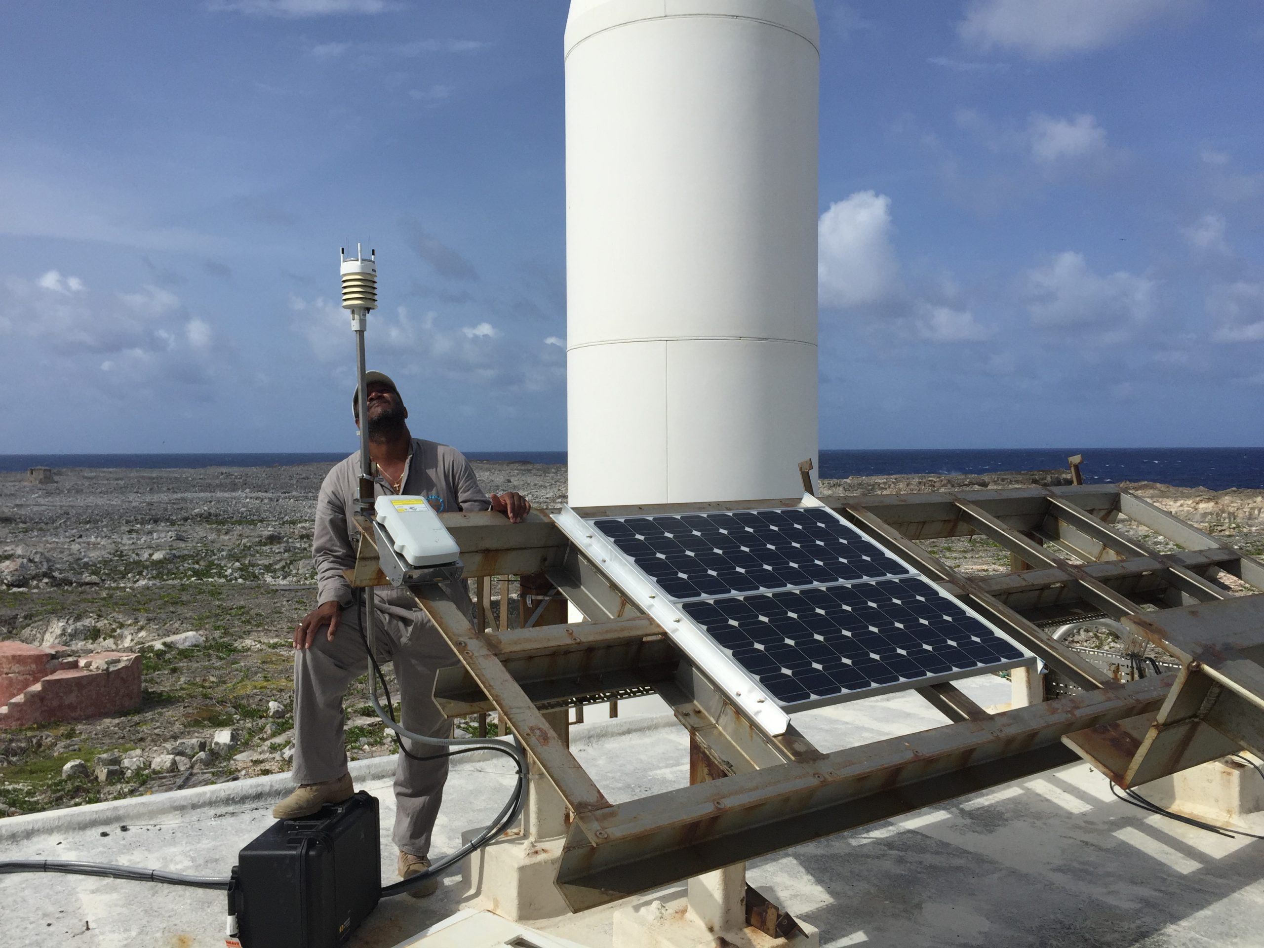 Edwin Carty is working on solar panels for the CN51 station.