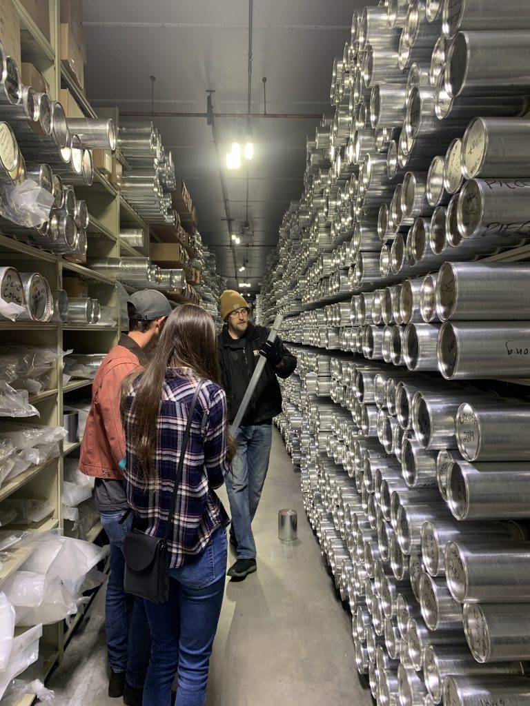 Richard Nunn showing ice cores to Geo-Launchpad Interns Jimmy Swift and Allison Sowers in the NSF Ice Core Facility.