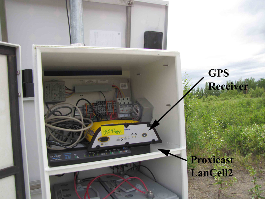 enclosure opened with devices inside, arrows point to GPS and to Proxicast LanCell 2