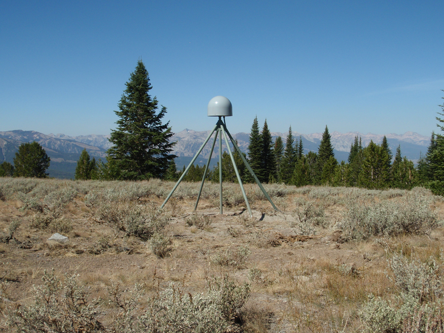 GPS/GNSS monument with five legs drilled into the ground and welded together to make a tripod frame