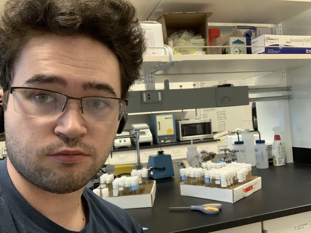 Selfie of USIP Intern Zach Courter in a biology laboratory at CU Denver.